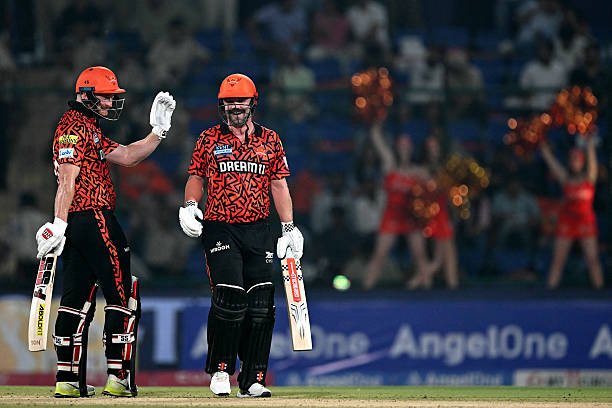 Sunrisers Hyderabad's Heinrich Klaasen (L) gestures next to his teammate Travis Head during the Indian Premier League (IPL) Twenty20 cricket match between Kolkata Knight Riders and Sunrisers Hyderabad at the Arun Jaitley Stadium in New Delhi on May 25, 2025.